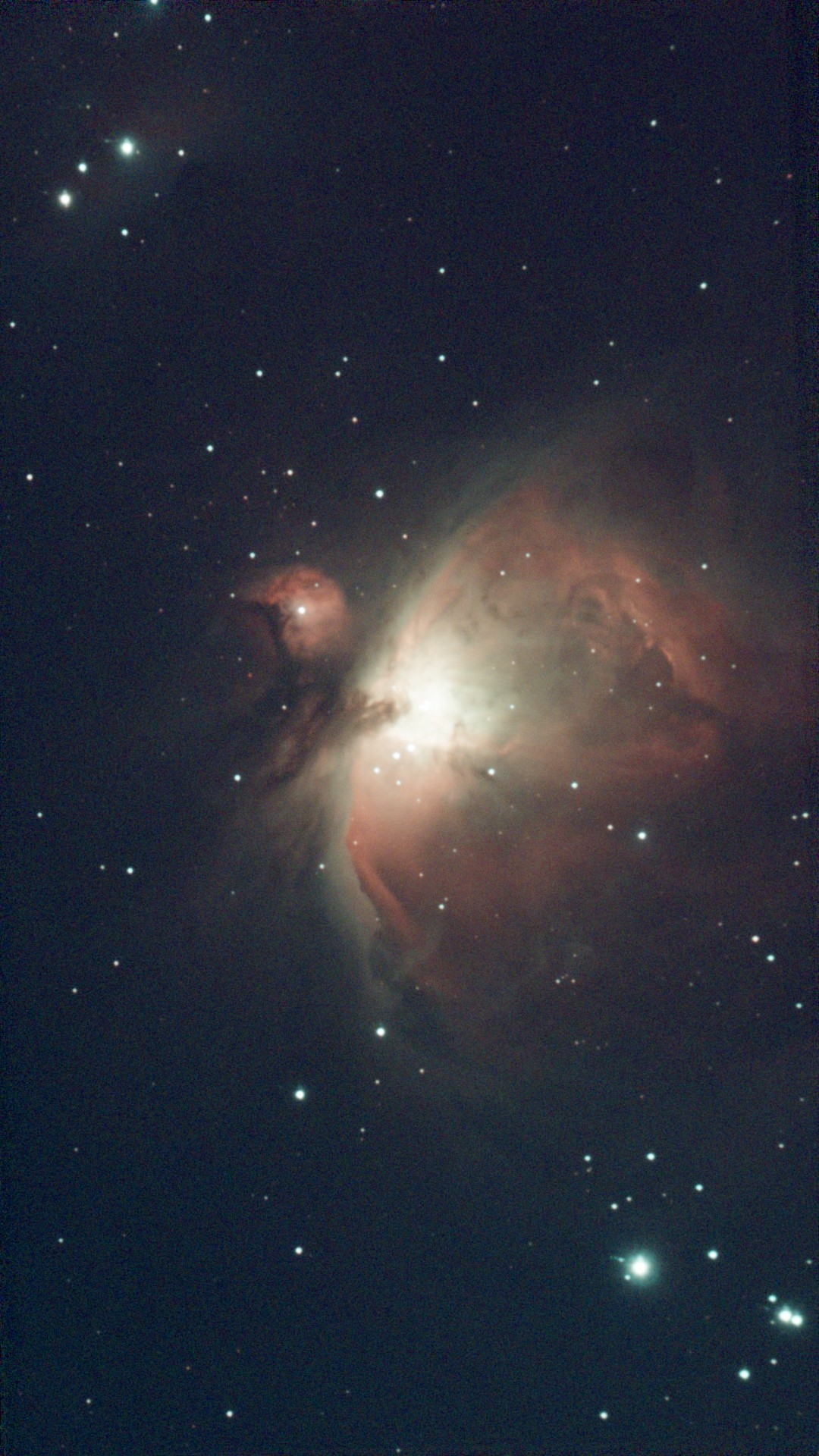 A photograph of the Orion/M42 nebula.